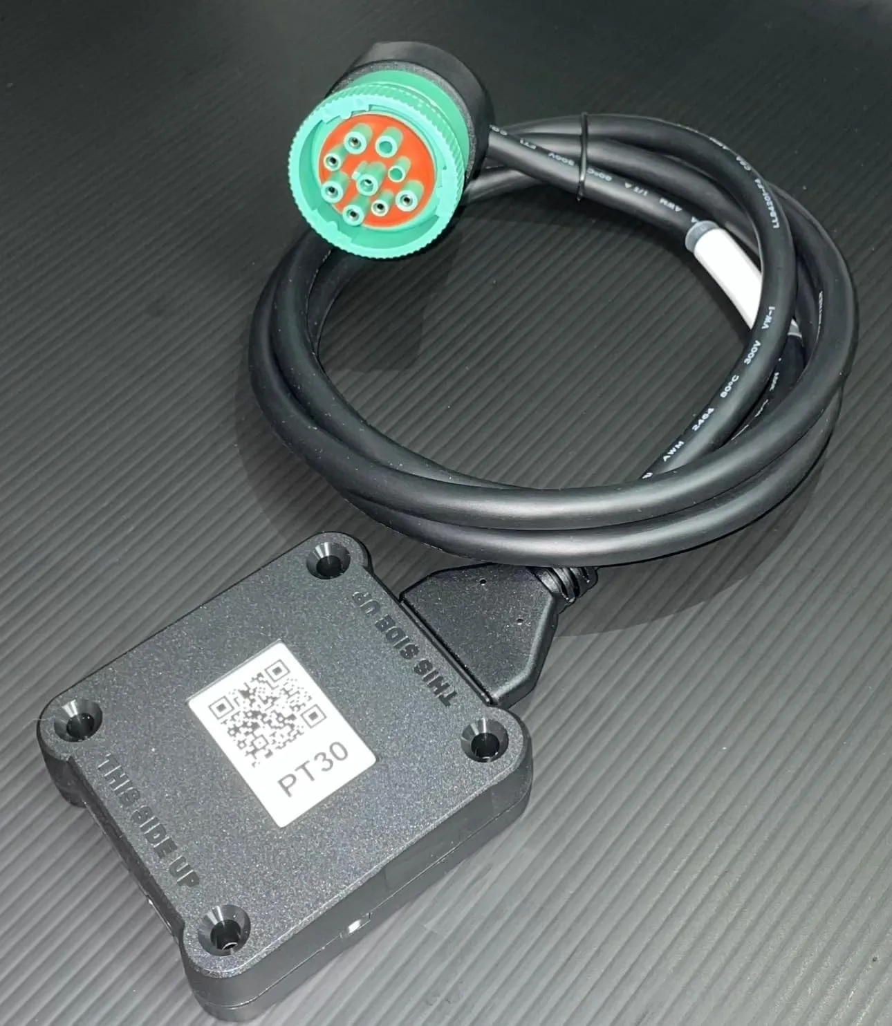 The PT30 ELD with its cable and green 9-pin plug